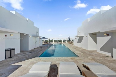 Exclusive boutique waterfront building with only 25 units on Indian Creek Country Club in Florida - for sale on GolfHomes.com, golf home, golf lot