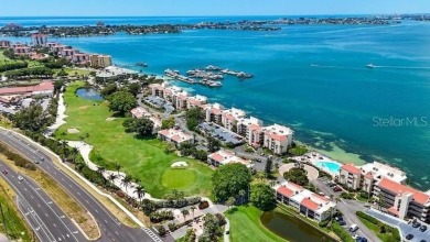 Exquisite FULLY FURNISHED 2-Bed/2-Bath 1st floor Condo Just on Isla Del Sol Yacht and Country Club in Florida - for sale on GolfHomes.com, golf home, golf lot