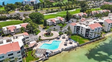 Exquisite FULLY FURNISHED 2-Bed/2-Bath 1st floor Condo Just on Isla Del Sol Yacht and Country Club in Florida - for sale on GolfHomes.com, golf home, golf lot