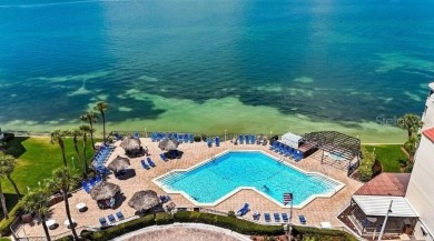 Exquisite FULLY FURNISHED 2-Bed/2-Bath 1st floor Condo Just on Isla Del Sol Yacht and Country Club in Florida - for sale on GolfHomes.com, golf home, golf lot