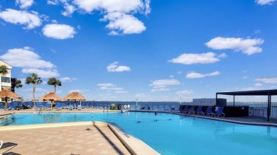 Exquisite FULLY FURNISHED 2-Bed/2-Bath 1st floor Condo Just on Isla Del Sol Yacht and Country Club in Florida - for sale on GolfHomes.com, golf home, golf lot