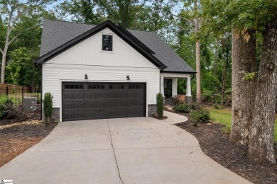 Welcome to this beautifully crafted 4-bedroom, 2.5-bathroom home on Pine Lake Golf Club in South Carolina - for sale on GolfHomes.com, golf home, golf lot