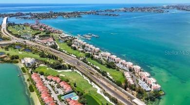 Exquisite FULLY FURNISHED 2-Bed/2-Bath 1st floor Condo Just on Isla Del Sol Yacht and Country Club in Florida - for sale on GolfHomes.com, golf home, golf lot