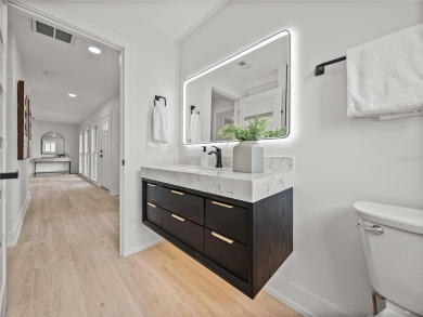 Welcome home, to this completely renovated coastal modern on Pasadena Yacht and Country Club in Florida - for sale on GolfHomes.com, golf home, golf lot
