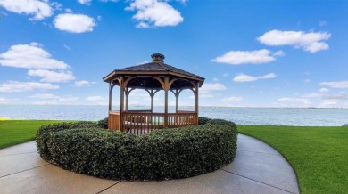 Exquisite FULLY FURNISHED 2-Bed/2-Bath 1st floor Condo Just on Isla Del Sol Yacht and Country Club in Florida - for sale on GolfHomes.com, golf home, golf lot