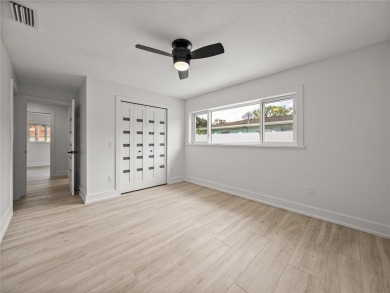 Welcome home, to this completely renovated coastal modern on Pasadena Yacht and Country Club in Florida - for sale on GolfHomes.com, golf home, golf lot