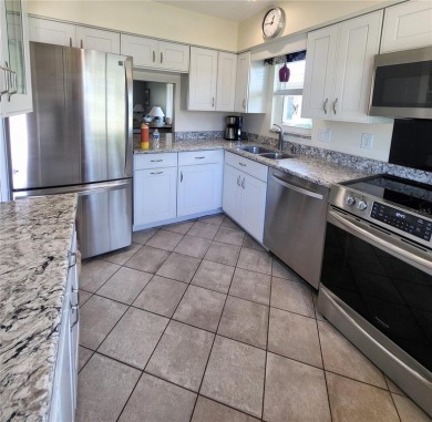 This highly sought-after and rarely available free-standing unit on IMG Academies Golf and Country Club in Florida - for sale on GolfHomes.com, golf home, golf lot