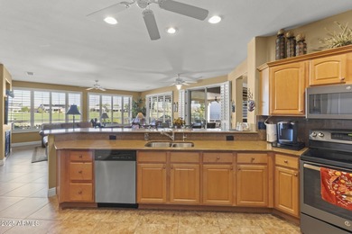 This exceptionally maintained 3-bedroom home in Sun City Grand on Sun City Grand Golf Couse and Club in Arizona - for sale on GolfHomes.com, golf home, golf lot
