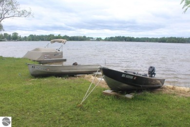 This beautifully maintained and recently updated home has 400 ft on Elk Rapids Golf Club in Michigan - for sale on GolfHomes.com, golf home, golf lot