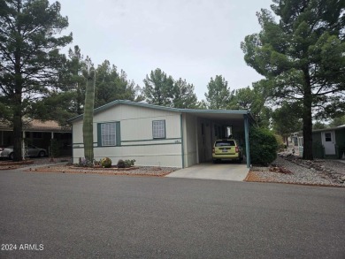 Charming 3-Bedroom Home in Pine Shadows 55+ Community - Comfort on Pine Shadows Golf Course in Arizona - for sale on GolfHomes.com, golf home, golf lot