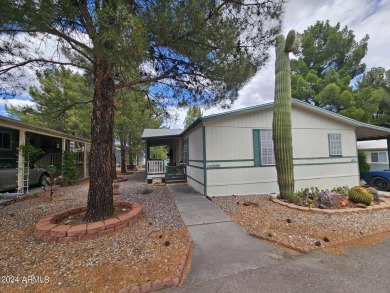 Charming 3-Bedroom Home in Pine Shadows 55+ Community - Comfort on Pine Shadows Golf Course in Arizona - for sale on GolfHomes.com, golf home, golf lot