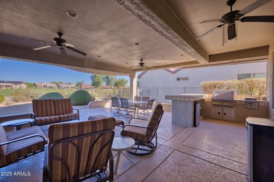 This exceptionally maintained 3-bedroom home in Sun City Grand on Sun City Grand Golf Couse and Club in Arizona - for sale on GolfHomes.com, golf home, golf lot