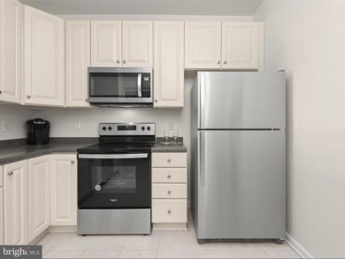 Welcome to 7325 Brookview Road #305, a beautifully maintained on The Timbers at Troy in Maryland - for sale on GolfHomes.com, golf home, golf lot