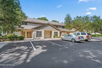 This unique Sunset Beach property in Sea Trail offers endless on Oyster Bay Golf Links in North Carolina - for sale on GolfHomes.com, golf home, golf lot