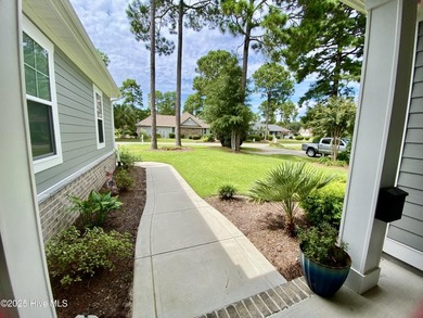 Prime Location in Sea Trail Plantation! This beautiful 4-bedroom on Sea Trail Golf Resort in North Carolina - for sale on GolfHomes.com, golf home, golf lot