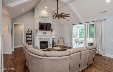 Prime Location in Sea Trail Plantation! This beautiful 4-bedroom on Sea Trail Golf Resort in North Carolina - for sale on GolfHomes.com, golf home, golf lot