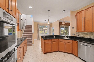 Beautiful custom lakefront home located on the Viera East Golf on Viera East Golf Club in Florida - for sale on GolfHomes.com, golf home, golf lot