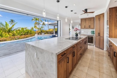 Set prominently on an elevated corner lot within the exclusive on Wailea Golf Club in Hawaii - for sale on GolfHomes.com, golf home, golf lot