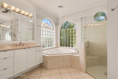 Beautiful custom lakefront home located on the Viera East Golf on Viera East Golf Club in Florida - for sale on GolfHomes.com, golf home, golf lot