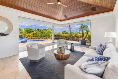 Set prominently on an elevated corner lot within the exclusive on Wailea Golf Club in Hawaii - for sale on GolfHomes.com, golf home, golf lot