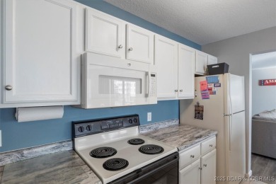 Stunning 3-Bedroom, 3-Bathroom Condo with Main Channel Views!
 on Seasons Ridge At Four Seasons in Missouri - for sale on GolfHomes.com, golf home, golf lot