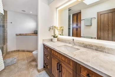 Set prominently on an elevated corner lot within the exclusive on Wailea Golf Club in Hawaii - for sale on GolfHomes.com, golf home, golf lot