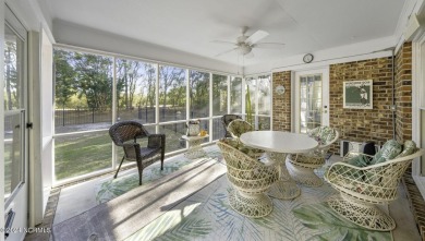 Possibly even 5 bedrooms in this over 2600sqft brick home in the on Masonboro Country Club in North Carolina - for sale on GolfHomes.com, golf home, golf lot