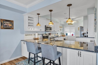 This rarely available end unit at the Bluffs in Baiting Hollow on Baiting Hollow Club in New York - for sale on GolfHomes.com, golf home, golf lot