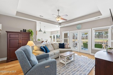 It is all about the view! This charming 3BR/2BA home has an on Carolina National Golf Club in North Carolina - for sale on GolfHomes.com, golf home, golf lot