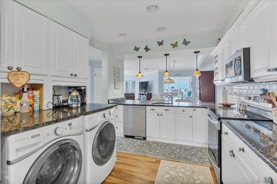 This rarely available end unit at the Bluffs in Baiting Hollow on Baiting Hollow Club in New York - for sale on GolfHomes.com, golf home, golf lot