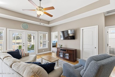 It is all about the view! This charming 3BR/2BA home has an on Carolina National Golf Club in North Carolina - for sale on GolfHomes.com, golf home, golf lot