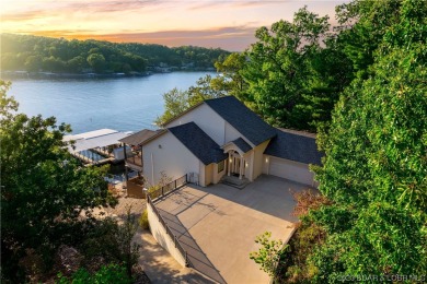 Luxurious Waterfront Retreat with 4 Master Suites, Sprawling on Bayview Golf Course in Missouri - for sale on GolfHomes.com, golf home, golf lot