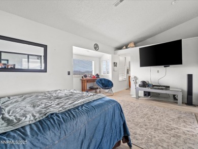 Spacious 3-bedroom, 3.5-bath with bonus loft bedroom and an on Sierra Sage Golf Course in Nevada - for sale on GolfHomes.com, golf home, golf lot