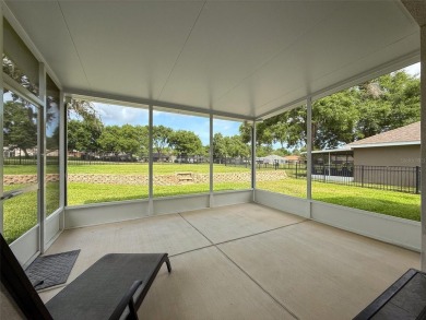 Enjoy Florida living at its finest in this beautifully on Meadow Oaks Golf and Country Club in Florida - for sale on GolfHomes.com, golf home, golf lot
