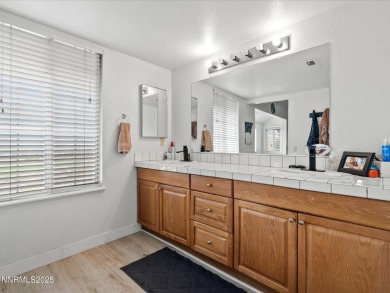 Spacious 3-bedroom, 3.5-bath with bonus loft bedroom and an on Sierra Sage Golf Course in Nevada - for sale on GolfHomes.com, golf home, golf lot
