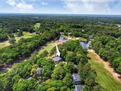 Well maintained 1st floor, end unit condo located on the 10th on Pawleys Plantation Golf and Country Club in South Carolina - for sale on GolfHomes.com, golf home, golf lot