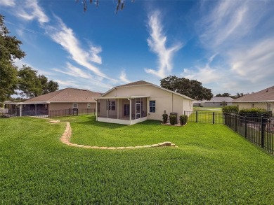 Enjoy Florida living at its finest in this beautifully on Meadow Oaks Golf and Country Club in Florida - for sale on GolfHomes.com, golf home, golf lot