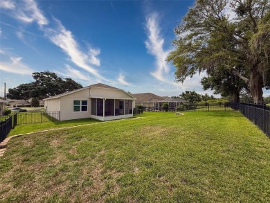 Enjoy Florida living at its finest in this beautifully on Meadow Oaks Golf and Country Club in Florida - for sale on GolfHomes.com, golf home, golf lot