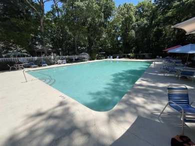 Well maintained 1st floor, end unit condo located on the 10th on Pawleys Plantation Golf and Country Club in South Carolina - for sale on GolfHomes.com, golf home, golf lot