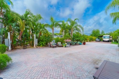 Under contract-accepting backup offers. Welcome to your slice of on The Groves Golf and Country Club in Florida - for sale on GolfHomes.com, golf home, golf lot
