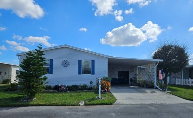 This 1997 Palm Harbor, 2-bedroom 2 bath home boasts 1,800 square on Big Cypress Golf and Country Club in Florida - for sale on GolfHomes.com, golf home, golf lot