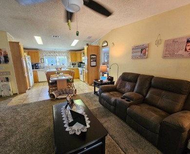 This 1997 Palm Harbor, 2-bedroom 2 bath home boasts 1,800 square on Big Cypress Golf and Country Club in Florida - for sale on GolfHomes.com, golf home, golf lot