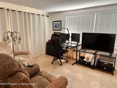 Discover move-in-ready convenience in this charming 2-bedroom on Heritage Pines Country Club in Florida - for sale on GolfHomes.com, golf home, golf lot