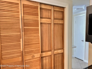 Discover move-in-ready convenience in this charming 2-bedroom on Heritage Pines Country Club in Florida - for sale on GolfHomes.com, golf home, golf lot