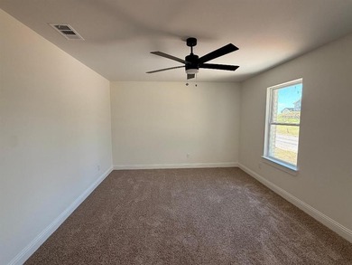 Don't miss this opportunity! This two-story, 4-bedroom, 3-bath on Holiday Hills Country Club in Texas - for sale on GolfHomes.com, golf home, golf lot