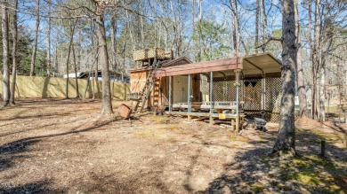 CHARMING LOG CABIN STYLE BUILD-OVER SITS PRETTY ON TRIPLE LOT!!! on River Golf and Country Club at Lake Royale in North Carolina - for sale on GolfHomes.com, golf home, golf lot