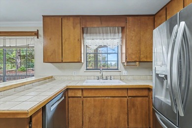 One or more photos has been virtually staged (office). Located on Killearn Country Club and Inn in Florida - for sale on GolfHomes.com, golf home, golf lot