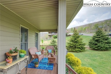 Sunset views, solar power, and space for everyone--this on Mountain Aire Golf Course in North Carolina - for sale on GolfHomes.com, golf home, golf lot