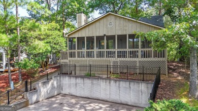 Welcome to 137 Narrows Loop - where thoughtful design meets on The Highlands Course at Lake Arrowhead in Georgia - for sale on GolfHomes.com, golf home, golf lot