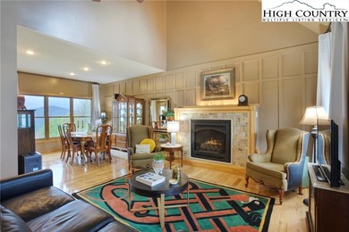 Sunset views, solar power, and space for everyone--this on Mountain Aire Golf Course in North Carolina - for sale on GolfHomes.com, golf home, golf lot